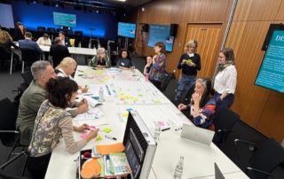 The participants at the Mutual Learning Exercise on SciComm in R&I in Berlin were divided into three groups, each with a subtopic, to discuss science communication in times of crisis and misinformation. The groups used silent brainstorming and post-its before engaging in the discussion.